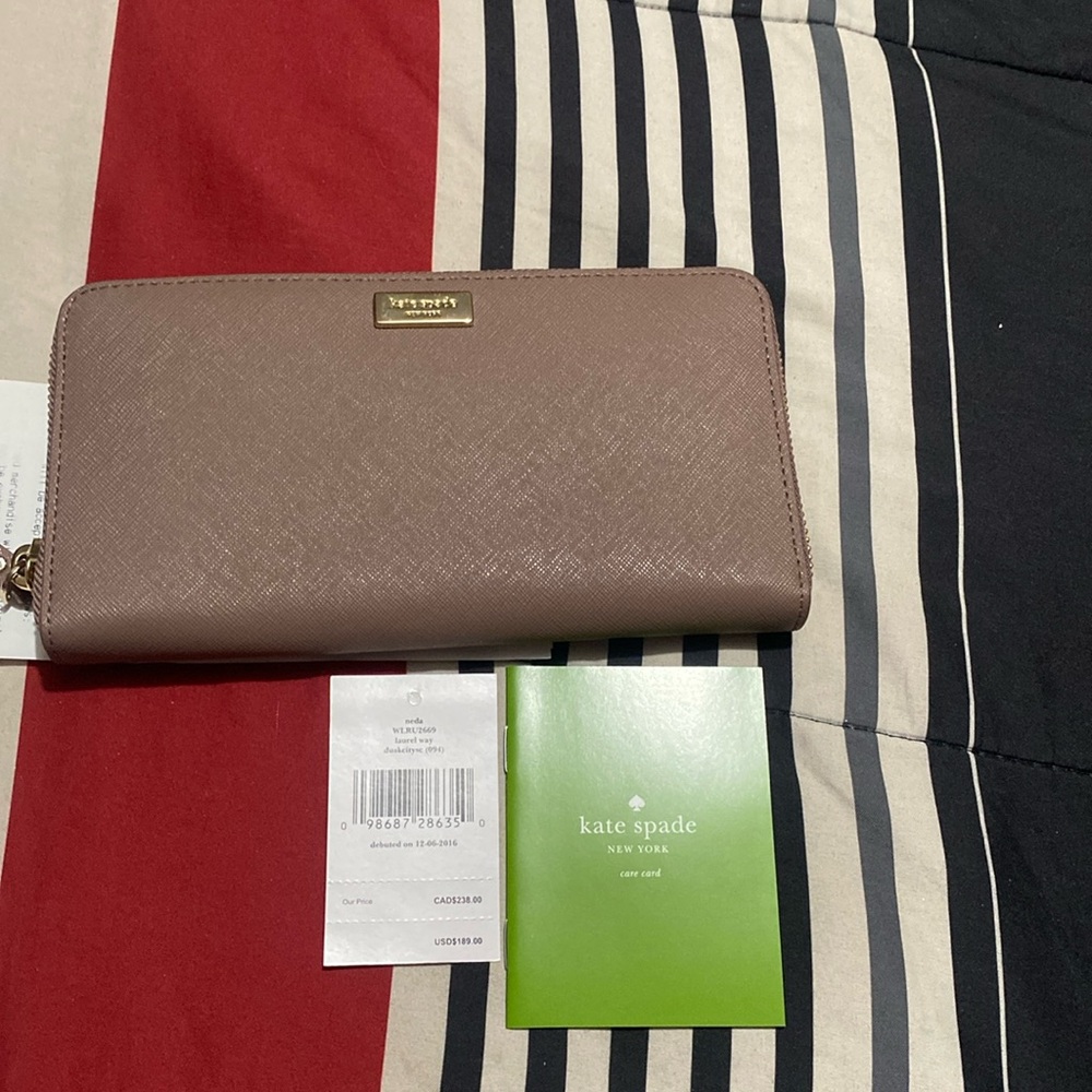 Kate spade laurel way wallet with tags
